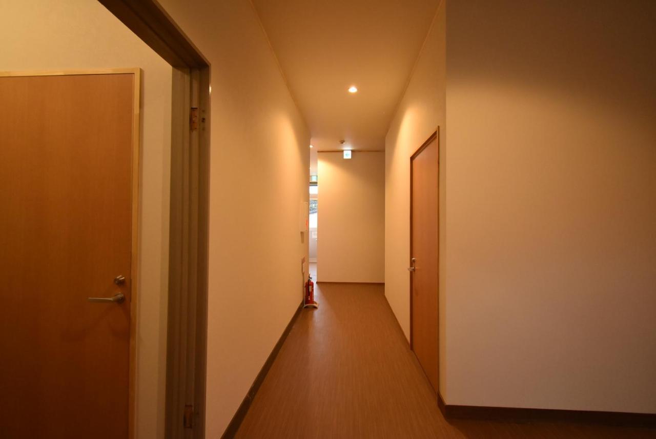 Guest House Iwato Такатихо Экстерьер фото