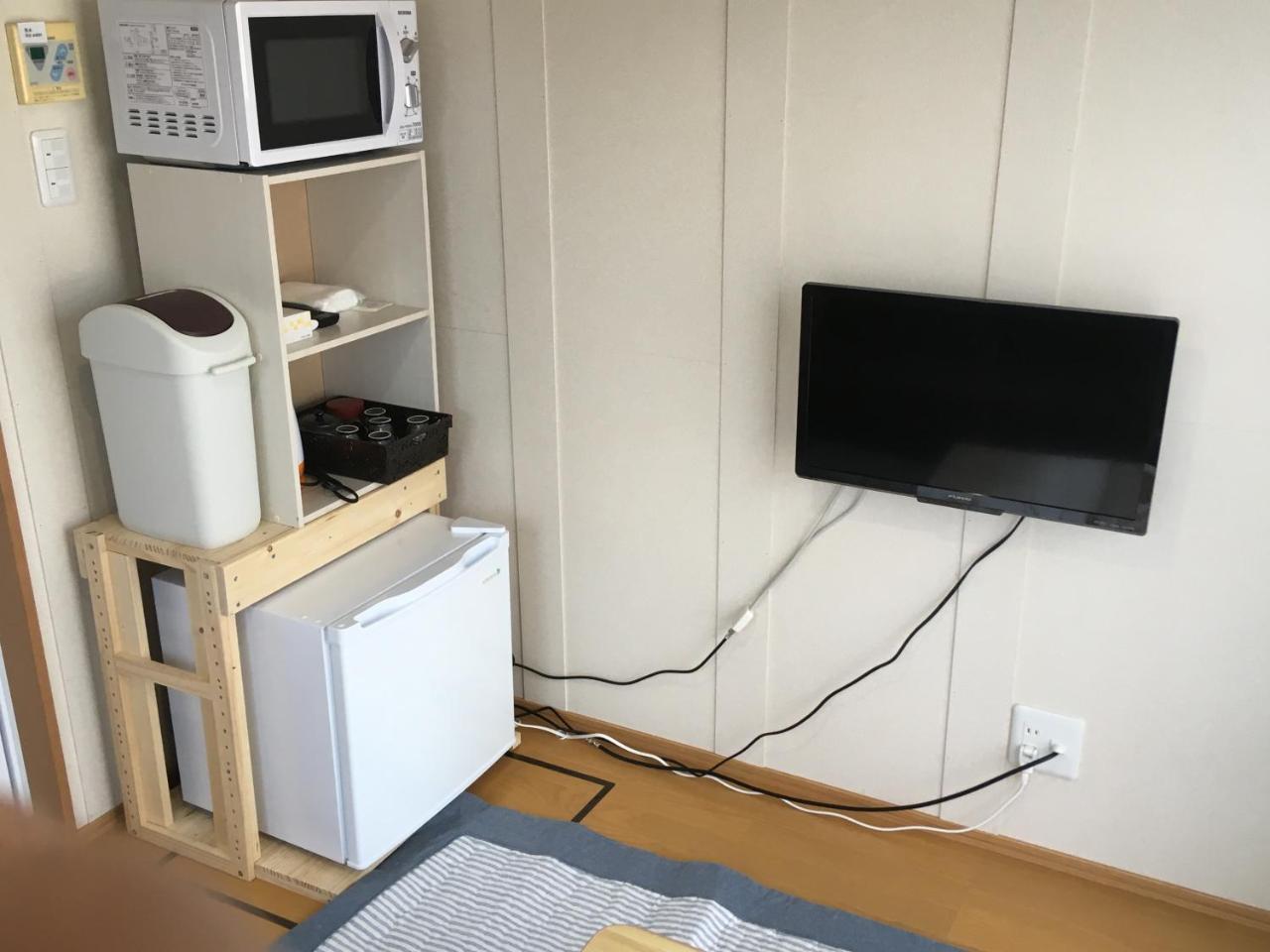 Guest House Iwato Такатихо Экстерьер фото